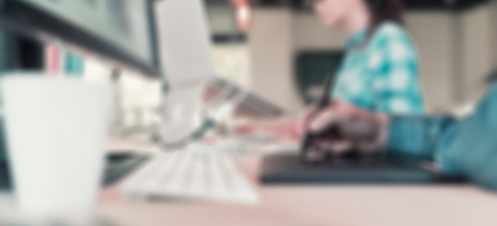 Man Working on graphic tablet in modern startup